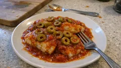 Ryba po portugalsku: dorsz w pomidorowym sosie z oliwkami, gotowy w 30 minut