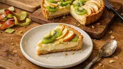 Lekka tarta z jabłkami i kiwi na kremie waniliowym – wygląda jak z cukierni